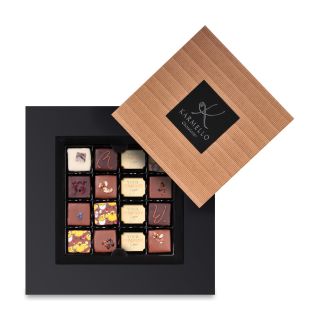 KW04 EASTER COLLECTION 16 PRALINES WITH LOGO IN A BOX WITH LID AND FRAME