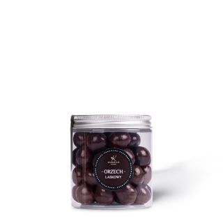 Hazelnut in dark chocolate in a jar