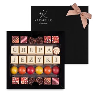 Collection of chocolates as a thank you from the group with a golden bow