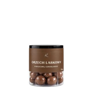 Hazelnut in milk chocolate in a jar